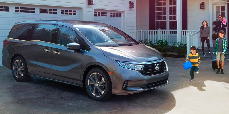 A gray Honda Odyssey.